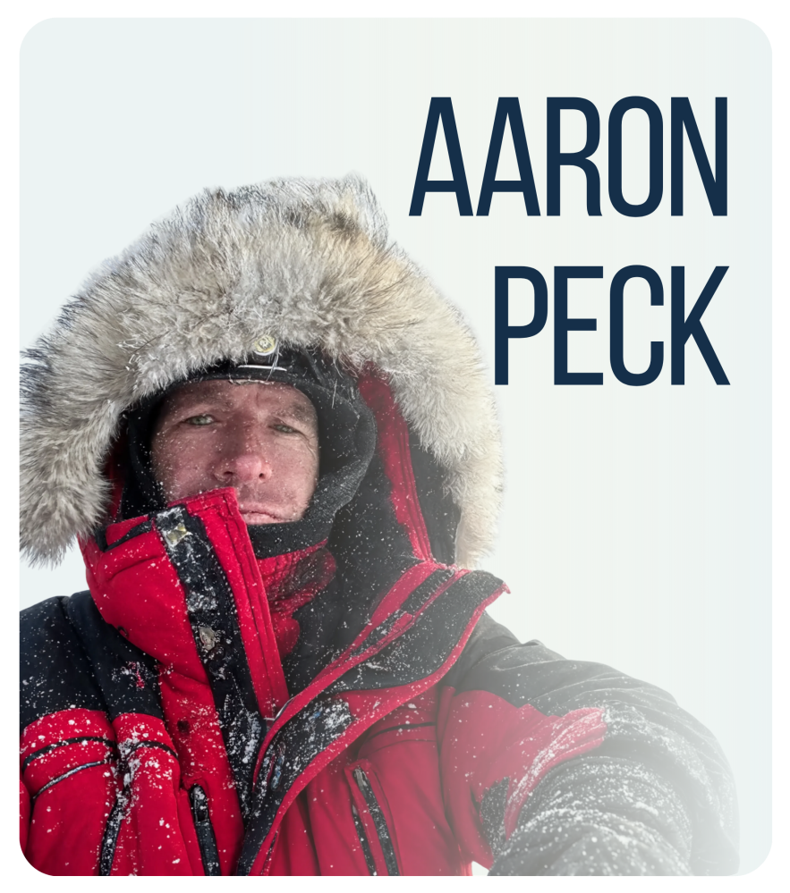 Person in red parka with fur hood in snowy setting, text 'Aaron Peck' beside.