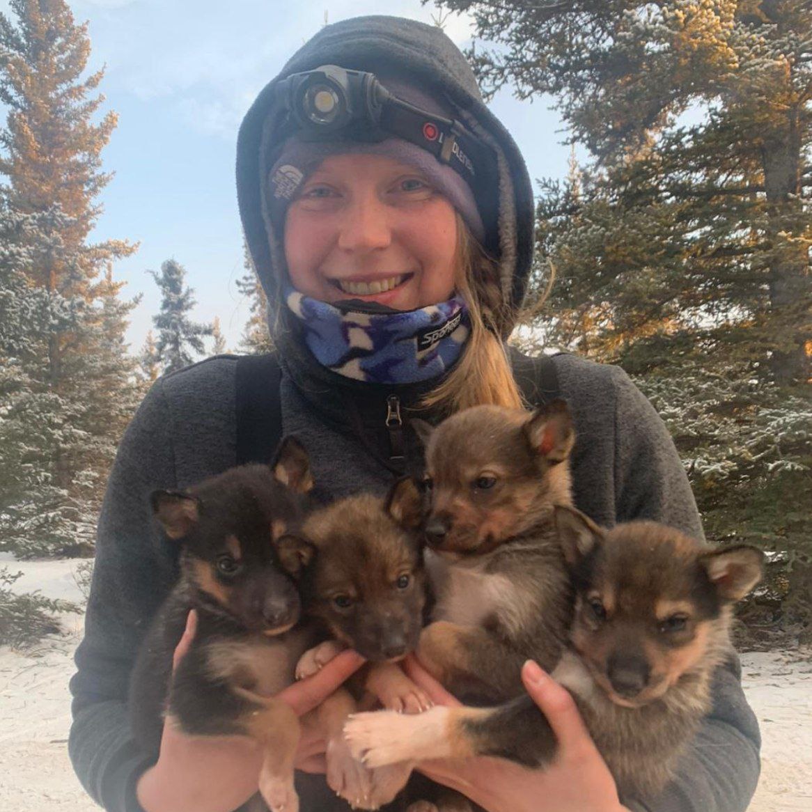 Nienke with our 4 puppies: Kiara, Mulan, Snow and Brave